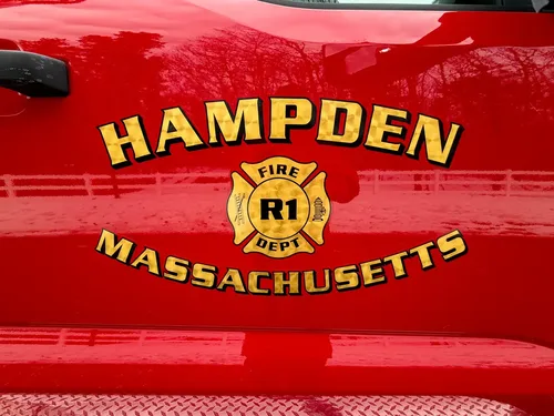 Door emblem close-up reading Hampden Massachusetts Rescue.